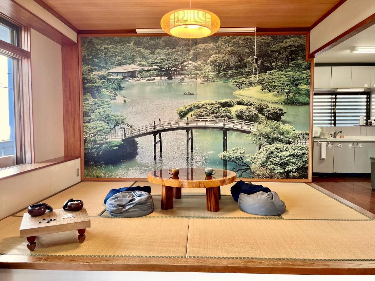 バーベキューもできる! 海と浜比嘉大橋を一望できる宿 Henza Exterior foto